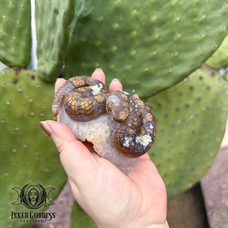 Load image into Gallery viewer, Agate Snake on Quartz Cluster for Transmuting Energy
